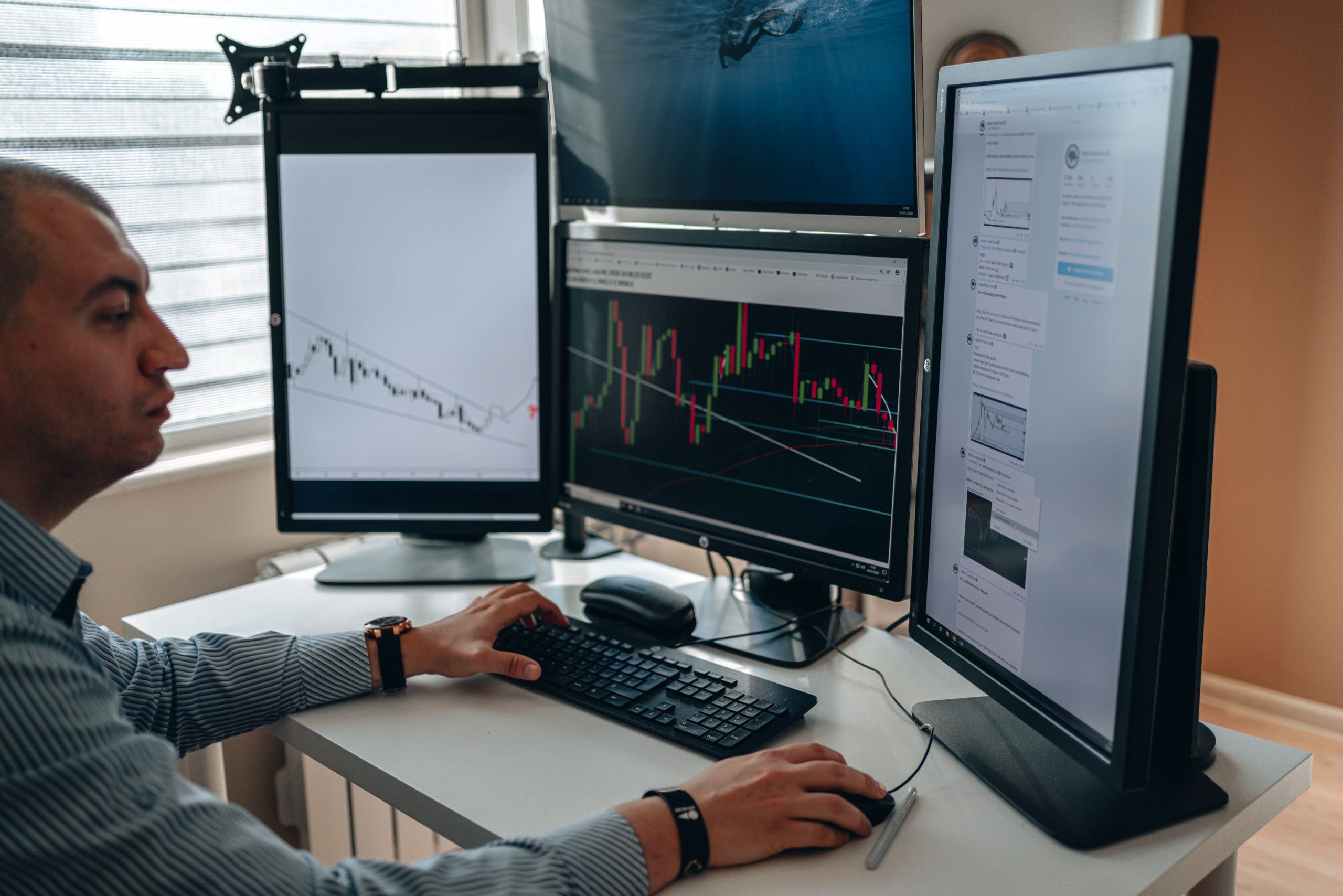 New York Stock Exchange trading floor,candlestick chart on monitor,London financial district skyline,US dollar banknotes,trader workstation multiple screens